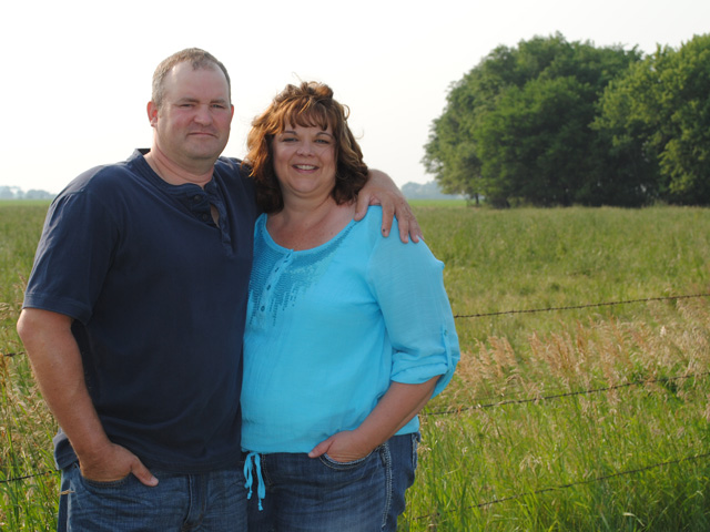 Nebraska hotline responder Michelle Soll (shown on land she farms with her husband, Mick) sees financial and emotional stress building, but not anywhere near 1980s levels. (Photo courtesy of Michelle Soll) 